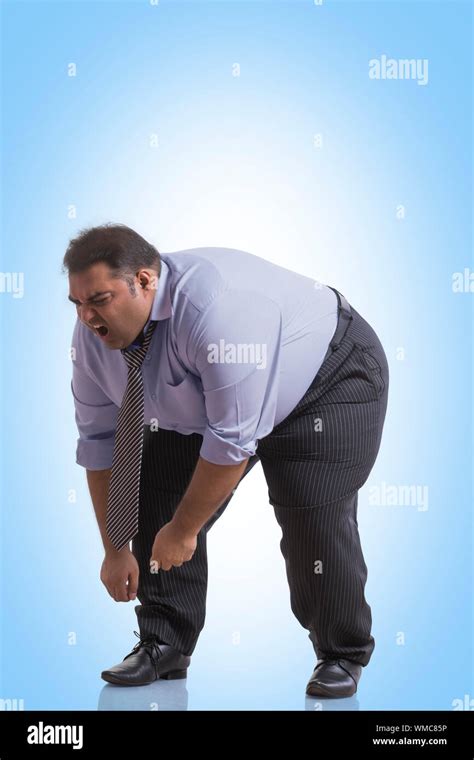 fat guy bending over|Bend Over Man Pictures, Images and Stock Photos